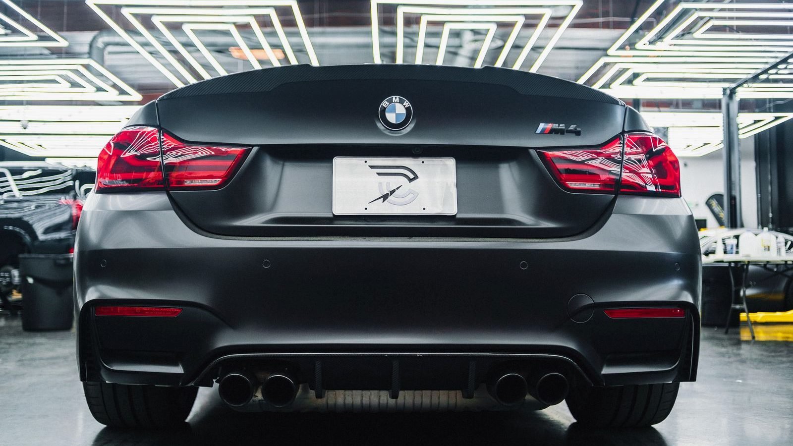 Black BMW M4 performance coupe serviced at Keesey's Auto Pro Care